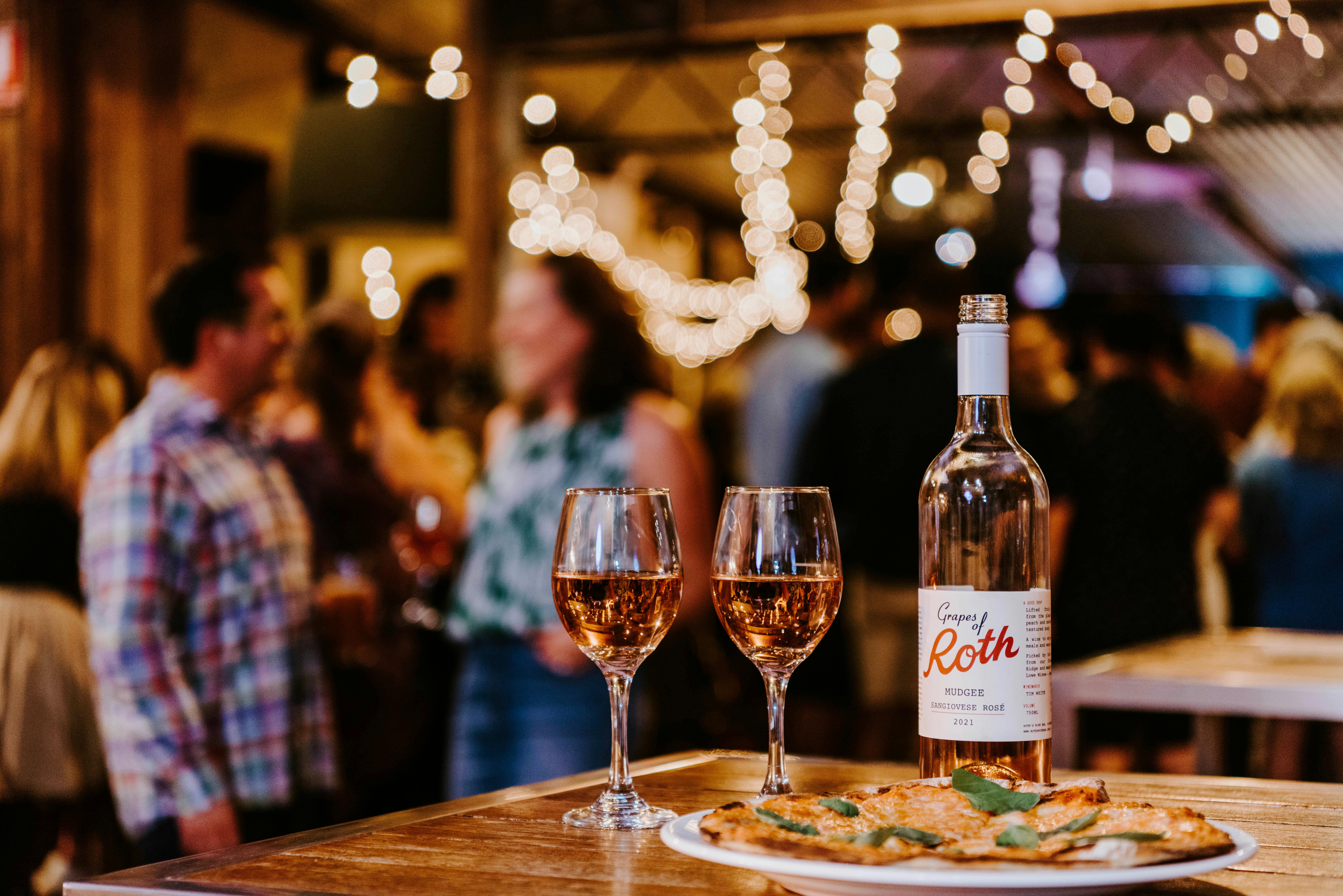 Grapes of Roth Sangiovese Rose paired with our famous wood-fired pizza